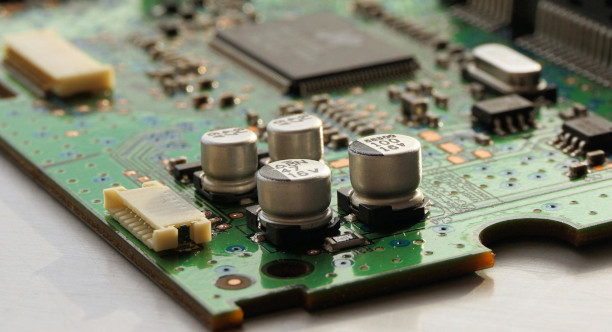 A multi-board assembly of rigid PCBs joined by board-to-board connectors